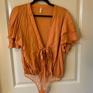 FREE PEOPLE L burnt orange bodysuit